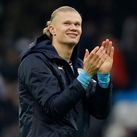 Worrying Moment: Pitch Invader Approaches Erling Haaland, Shielded by Team Official